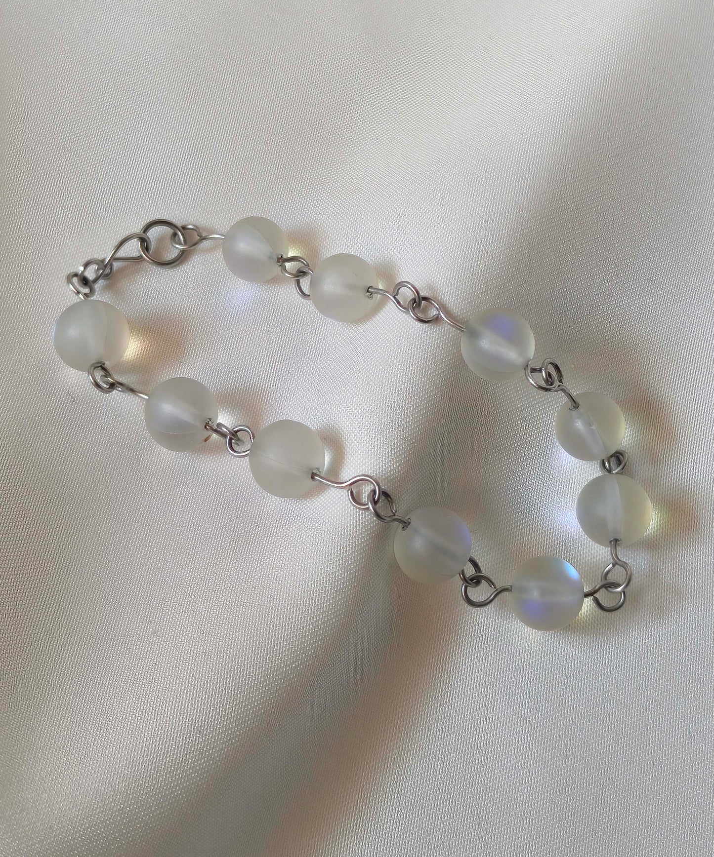 Lumina Glow – White Flash Glass Bead Linked Bracelet